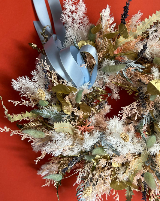 Another view of the Blue Icing preserved wreath in blue and white