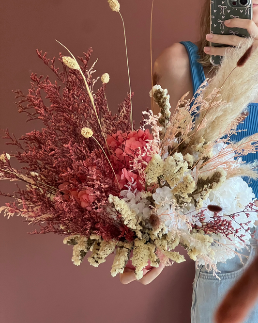 Sangria dried arrangement detail — dark red botanical tones, Gathered+Styled Singapore
