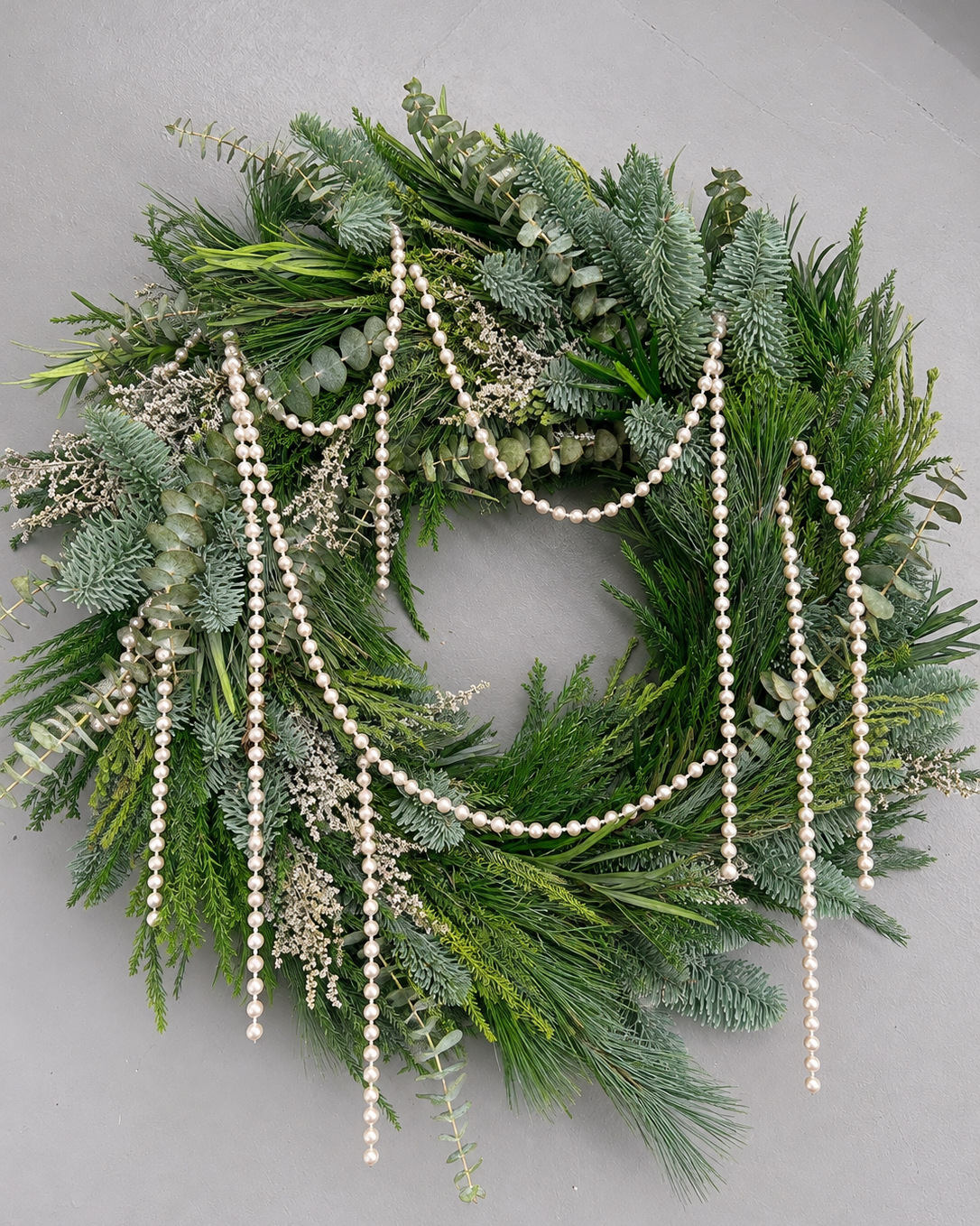 Minimalistic pearl Christmas wreath: fresh pine, 30cm, strung with pearls, Singapore