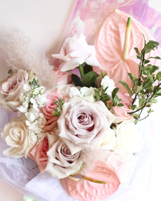Pastel bridal bouquet with cream and peach blooms — Singapore florist