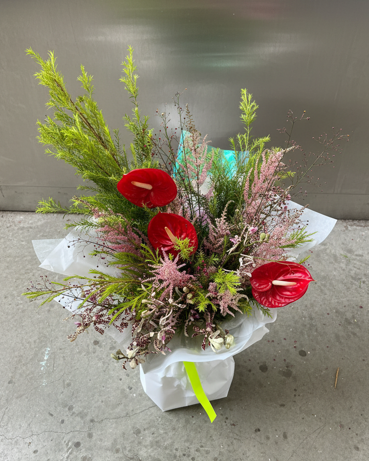a large bouquet with anthuriums, lush foliage and astilbe by Gathered+Styled, Singapore 