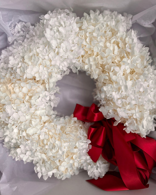 White Christmas preserved hydrangea wreath, about 35cm, finished with satin bows