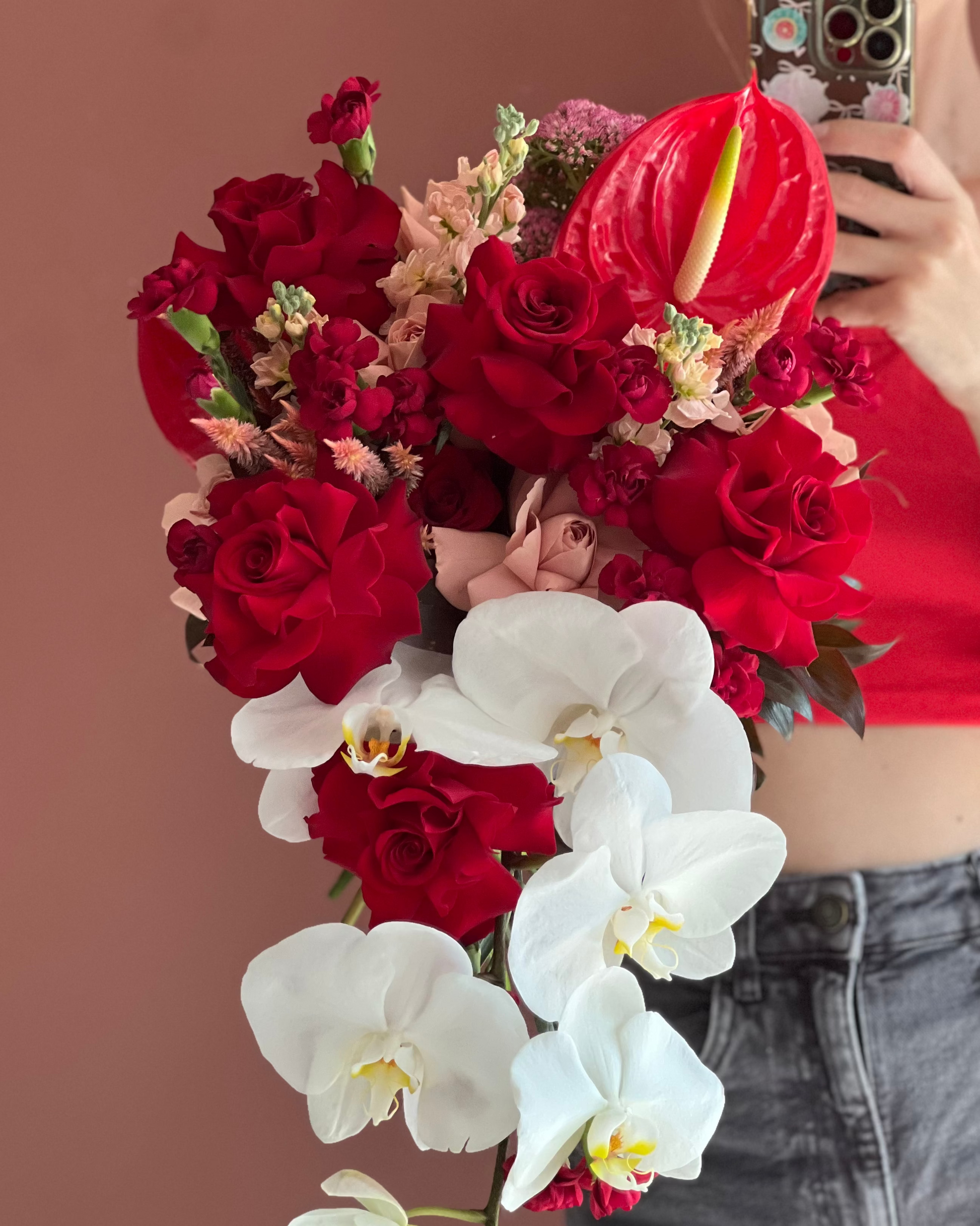 Cascade bridal bouquet in deep red and white flowers — Singapore florist
